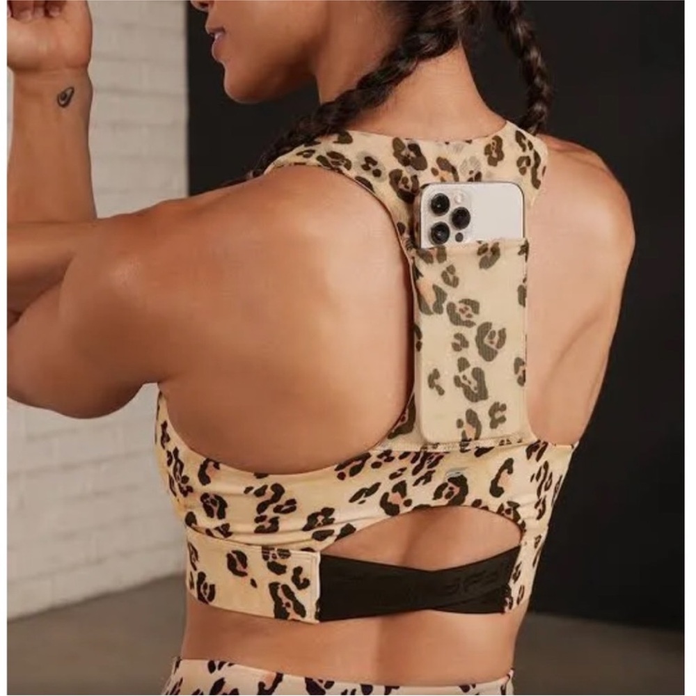 Fabletics On-The-Go Midi Sports Bra Leopard Print Athletic Small with pocket